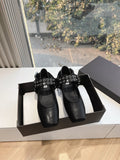 ALAIA 26S FLATS IN BLACK CALFSKIN WITH SILVER STUD STRAP