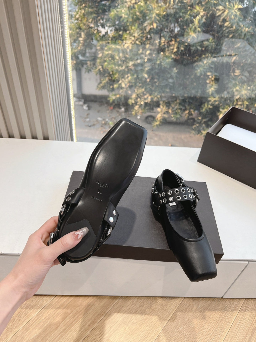 ALAIA 26S FLATS IN BLACK CALFSKIN WITH SILVER STUD STRAP