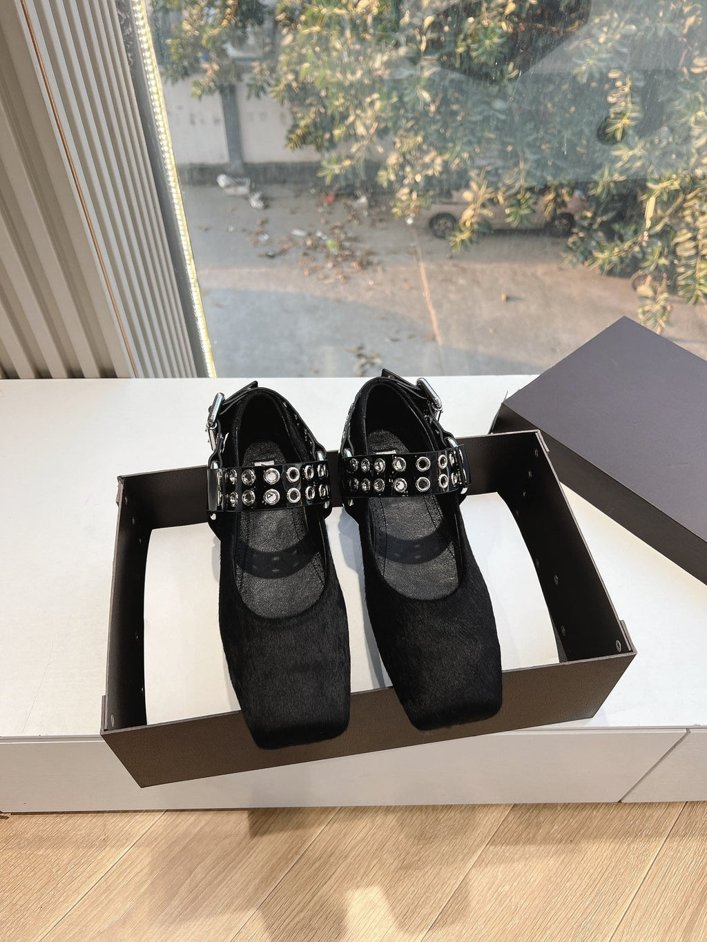 ALAIA 26S FLATS IN BLACK PONY HAIR WITH SILVER STUD STRAP