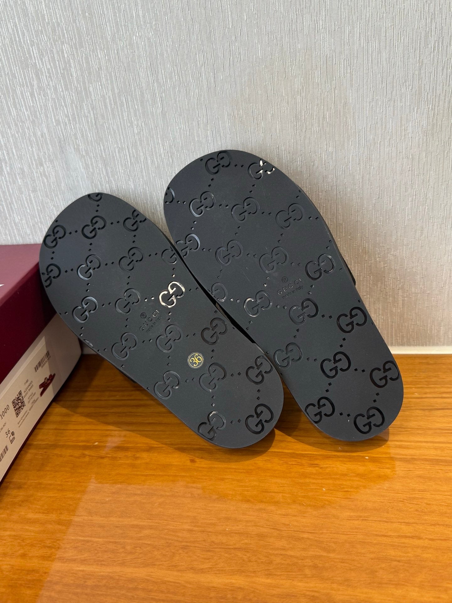 GG SLIDES IN BLACK SUEDE WITH EMBOSSED LOGO