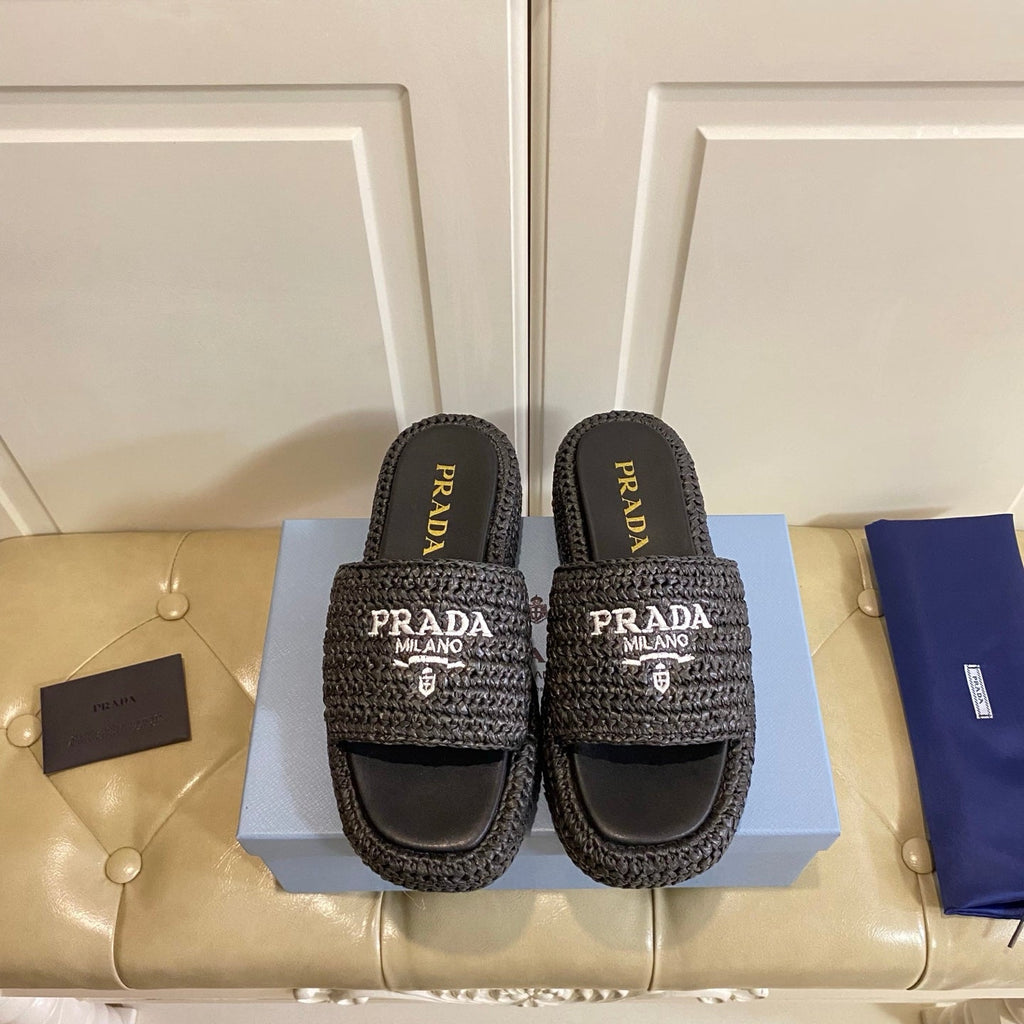 PRADA 26S SLIDE SANDALS IN BLACK LOGO RAFFIA