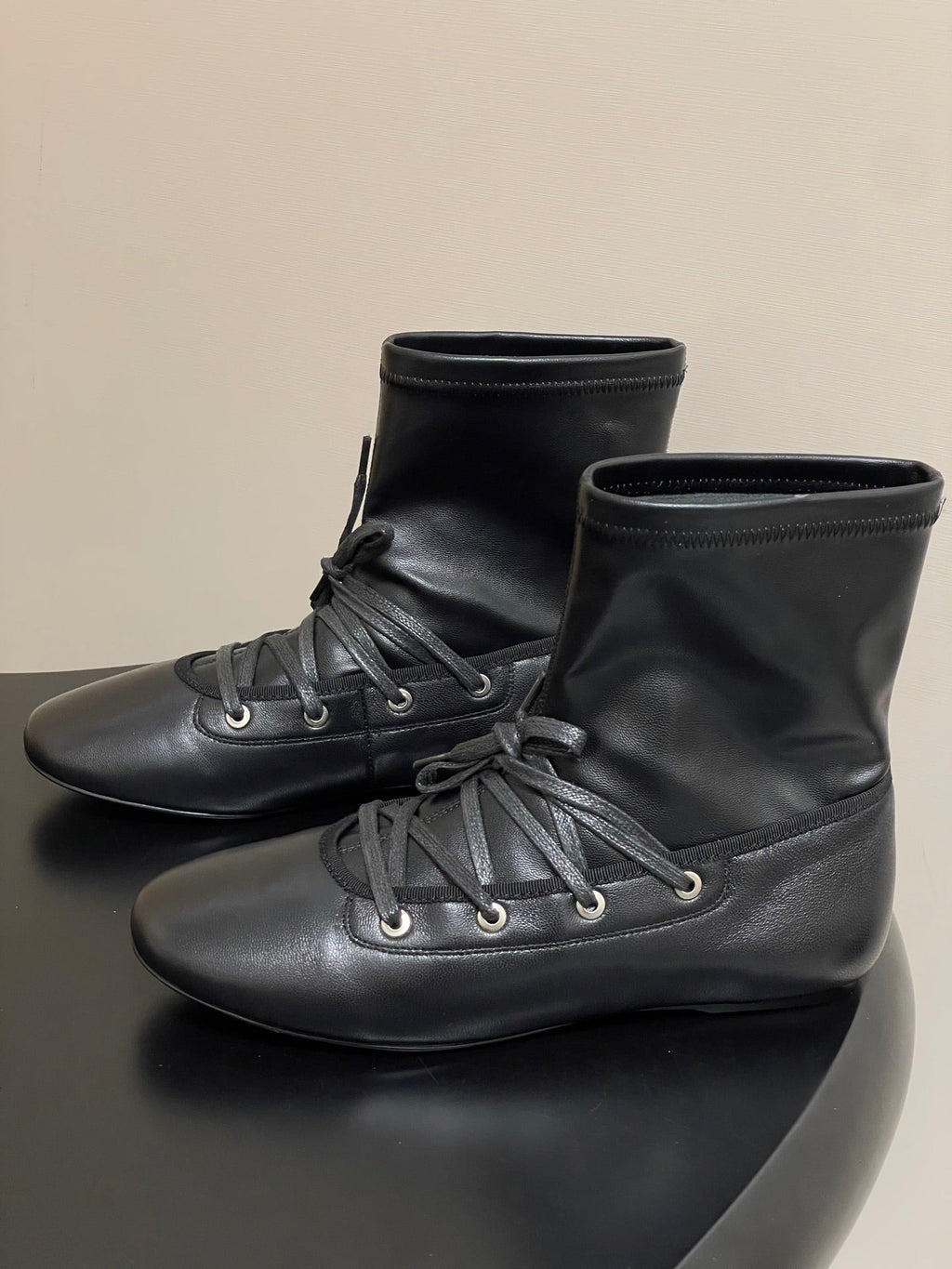 ALO 25S PALOMA WOOL FLAT ANKLE BOOTS IN BLACK LAMBSKIN