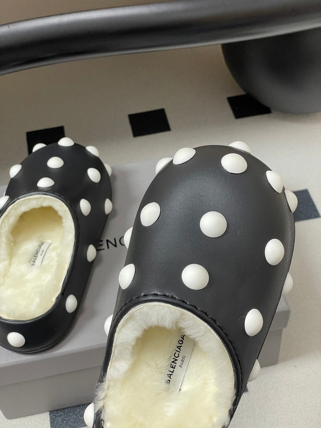 BALENCIAGA 25S FUR-LINED MULES IN BLACK AND WHITE FAUX LEATHER