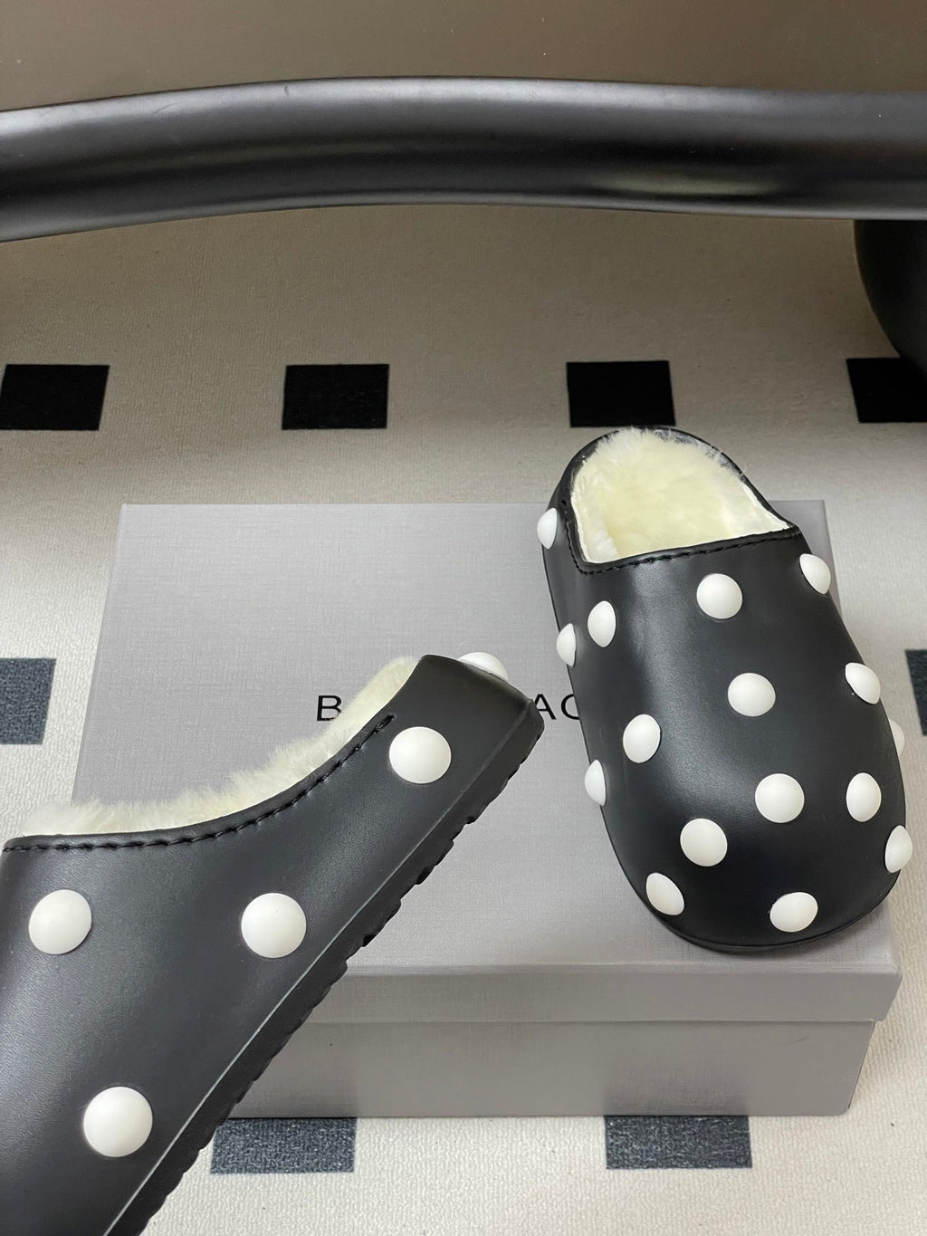 BALENCIAGA 25S FUR-LINED MULES IN BLACK AND WHITE FAUX LEATHER