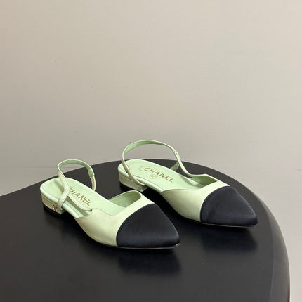 CHANEL 26S POINTED TOE SLINGBACKS IN PASTEL GREEN LAMBSKIN AND BLACK FABRIC