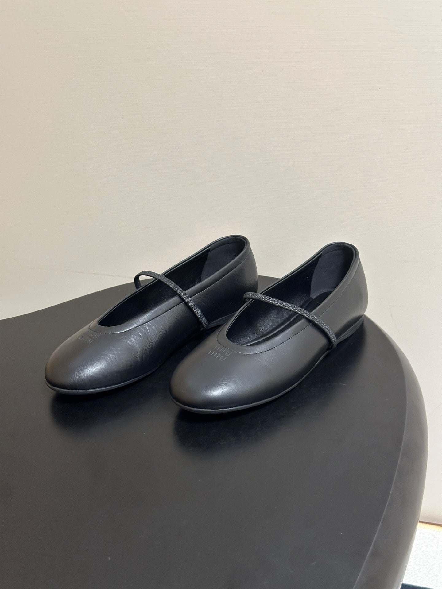 MIUMIU 26S BALLET FLATS IN BLACK LAMBSKIN
