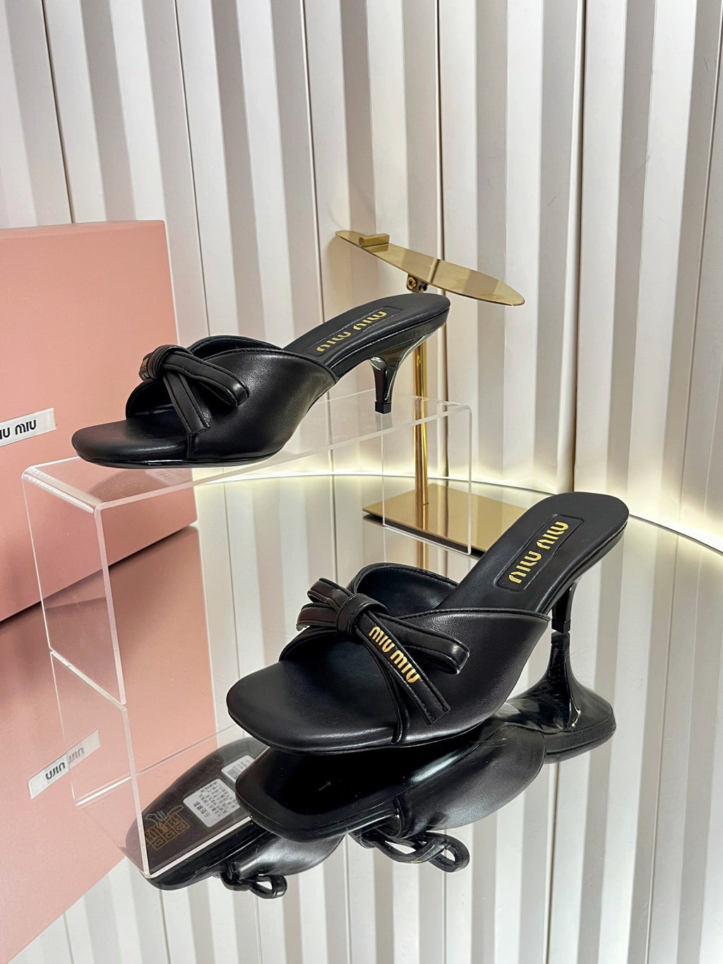 MIUMIU 26S MULE SANDALS 55MM IN BLACK CALFSKIN WITH BOW