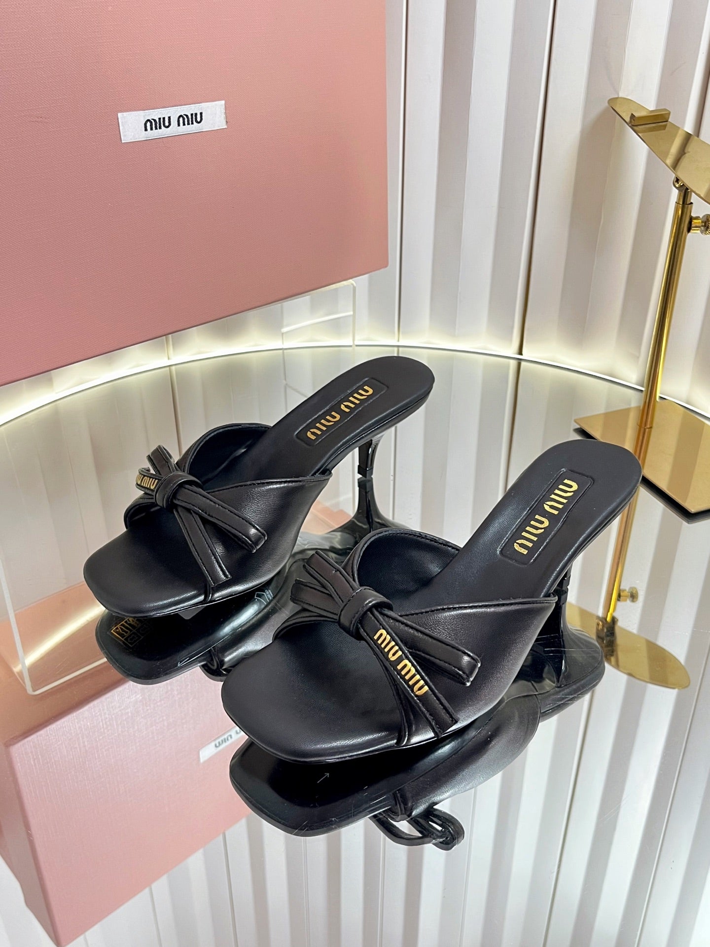 MIUMIU 26S MULE SANDALS 55MM IN BLACK CALFSKIN WITH BOW