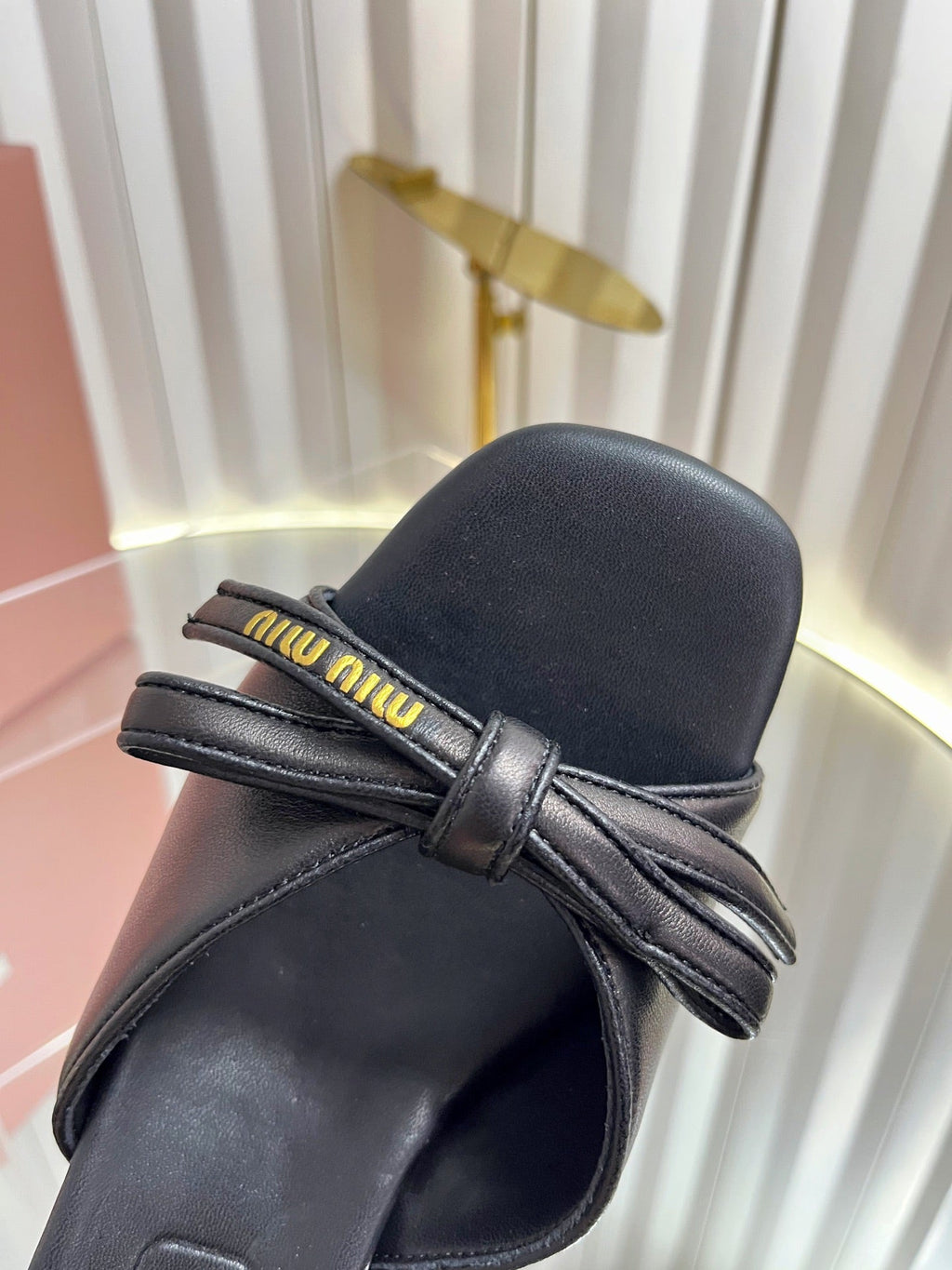 MIUMIU 26S MULE SANDALS 55MM IN BLACK CALFSKIN WITH BOW