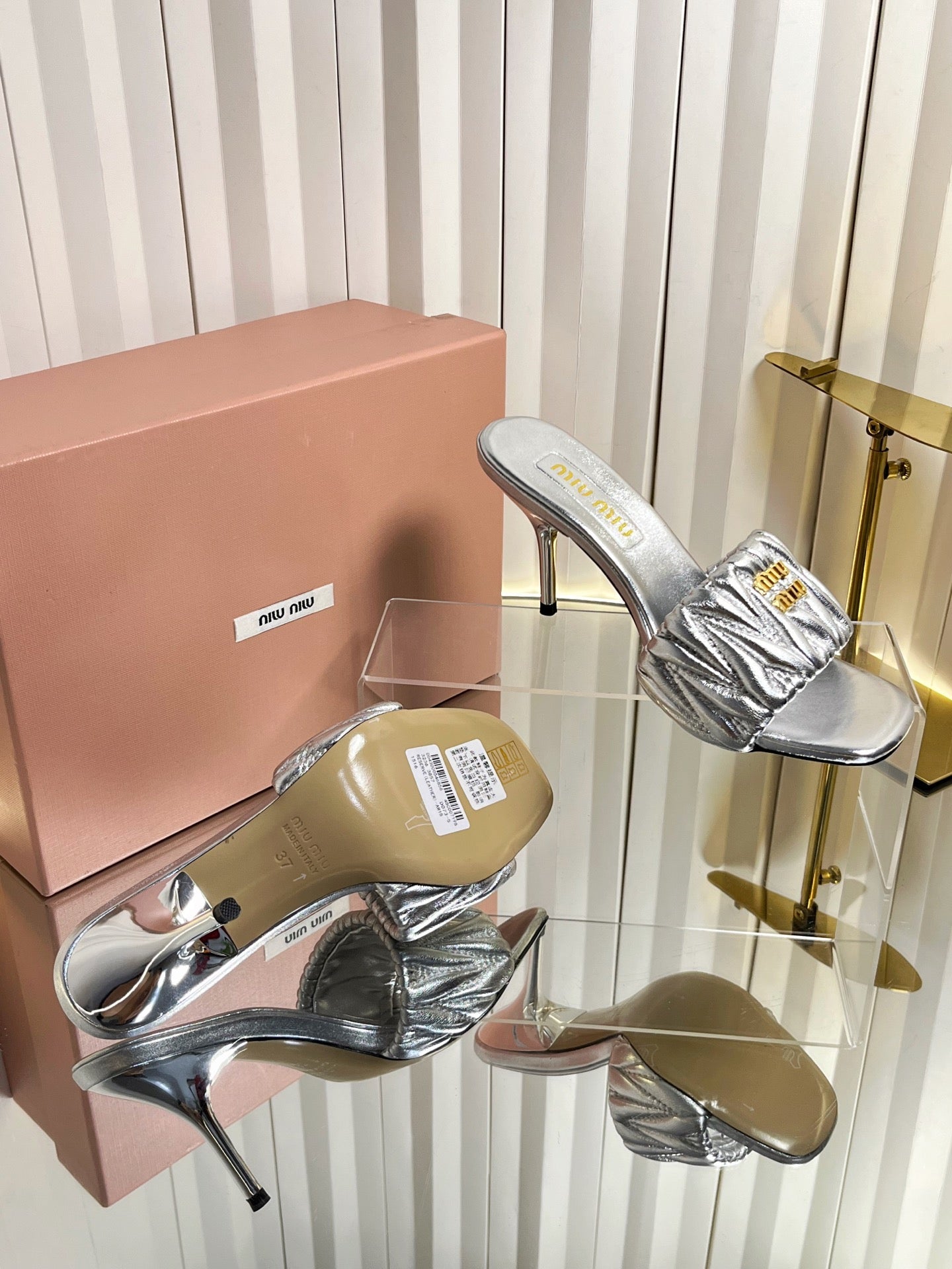MIUMIU 26S HIGH-HEEL MULE SANDALS 85MM IN SILVER CALFSKIN GOLD HARDWARE