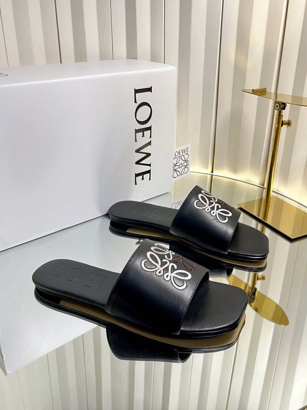 LOEWE 26S LOGO-EMBROIDERED SANDALS IN BLACK CALFSKIN