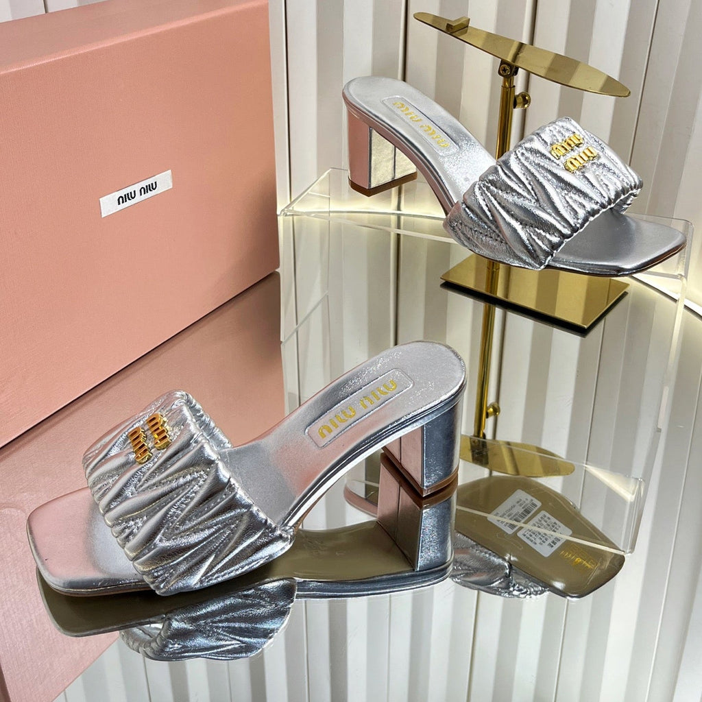 MIUMIU 26S PADDED MATELASSE MULE HEELS 65MM IN SILVER CALFSKIN GOLD HARDWARE