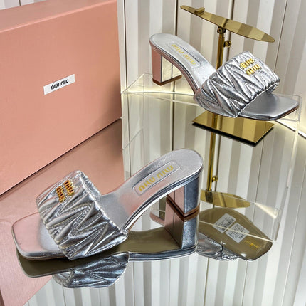 MIUMIU 26S PADDED MATELASSE MULE HEELS 65MM IN SILVER CALFSKIN GOLD HARDWARE