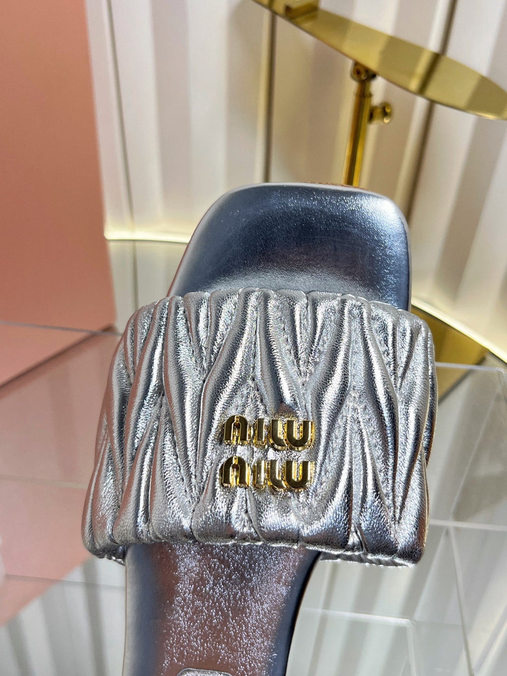 MIUMIU 26S MATELASSE SLIDES IN SILVER CALFSKIN GOLD HARDWARE