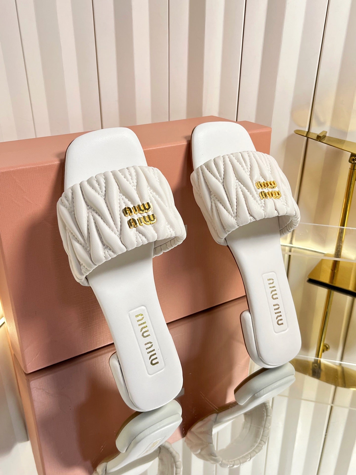 MIUMIU 26S MATELASSE SLIDES IN IVORY WHITE CALFSKIN GOLD HARDWARE
