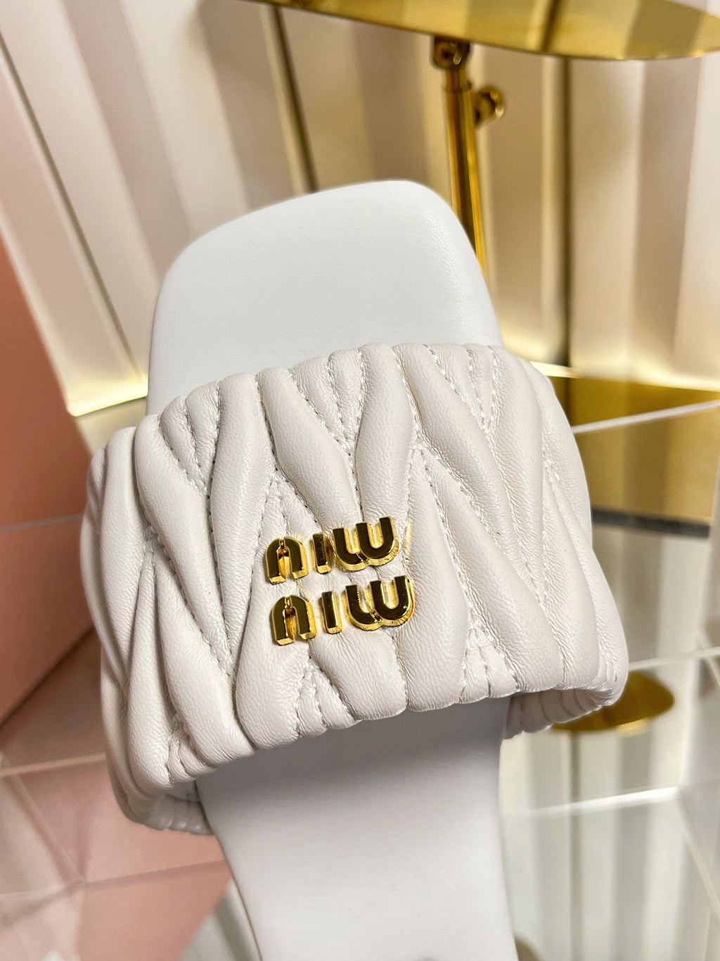 MIUMIU 26S MATELASSE SLIDES IN IVORY WHITE CALFSKIN GOLD HARDWARE