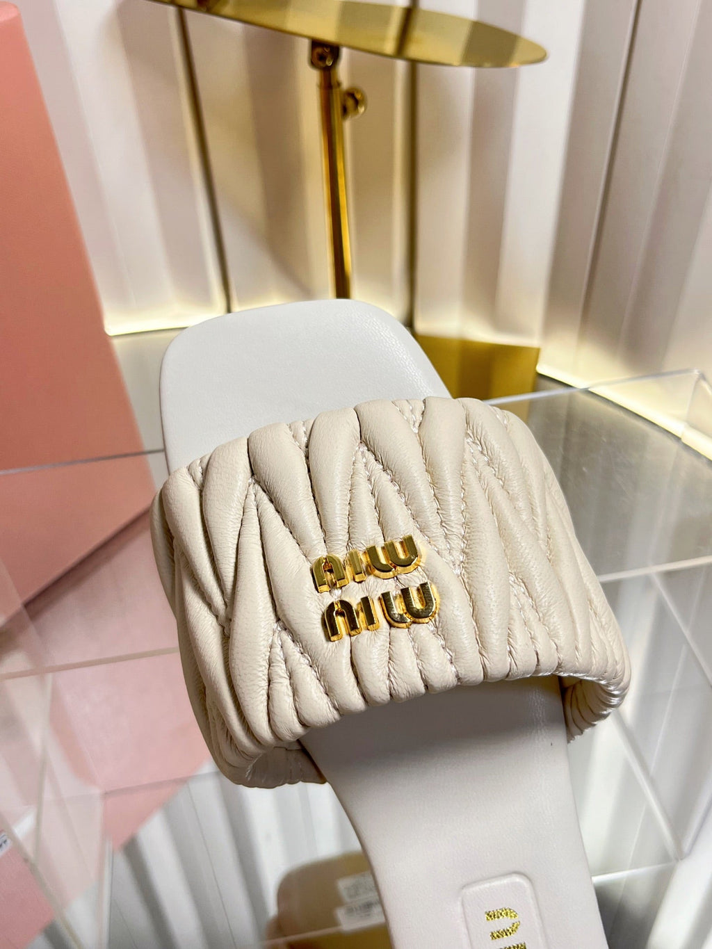 MIUMIU 26S MATELASSE SLIDES IN LIGHT BEIGE CALFSKIN GOLD HARDWARE
