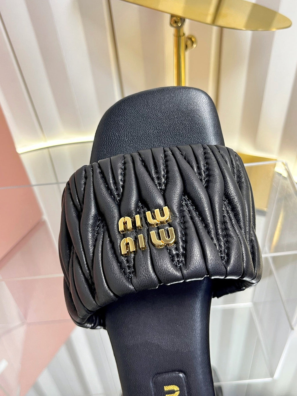 MIUMIU 26S MATELASSE SLIDES IN BLACK CALFSKIN GOLD HARDWARE