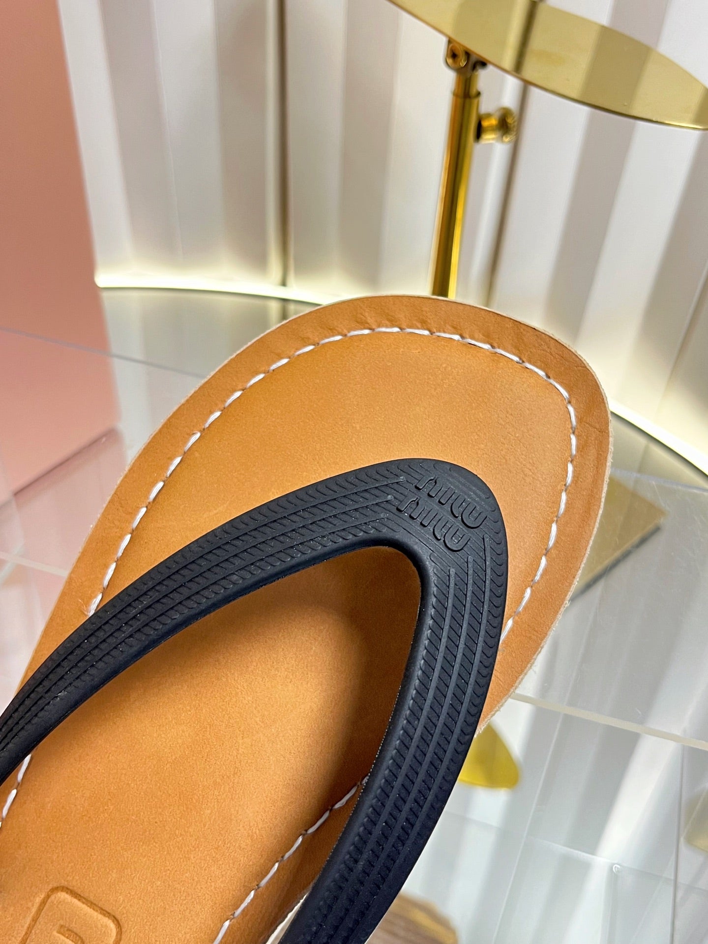 MIUMIU 26S THONG FLAT SANDALS IN BLACK CALFSKIN