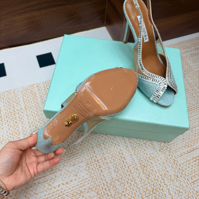AQUAZZURA 26S HEELED SLINGBACK SANDALS 100 MM IN LIGHT BLUE RAFFIA TEXTURE