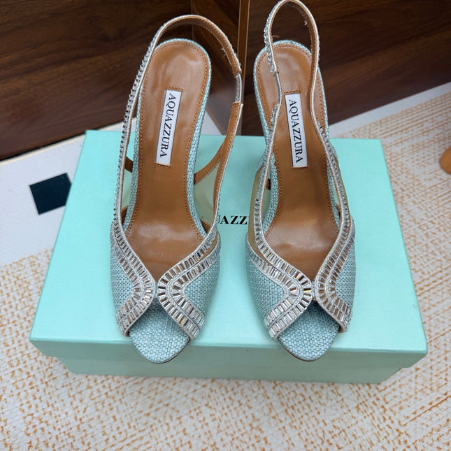 AQUAZZURA 26S HEELED SLINGBACK SANDALS 100 MM IN LIGHT BLUE RAFFIA TEXTURE