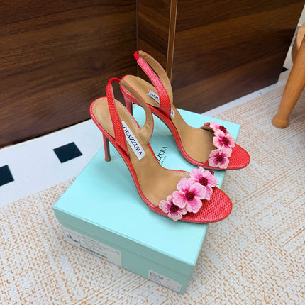 AQUAZZURA 26S HEELED SANDALS 100 MM IN CORAL RED RAFFIA TEXTURE