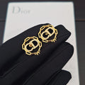 CD 26S CRYSTAL CHAIN LOGO STUD EARRINGS IN GOLD TONE METAL 645589
