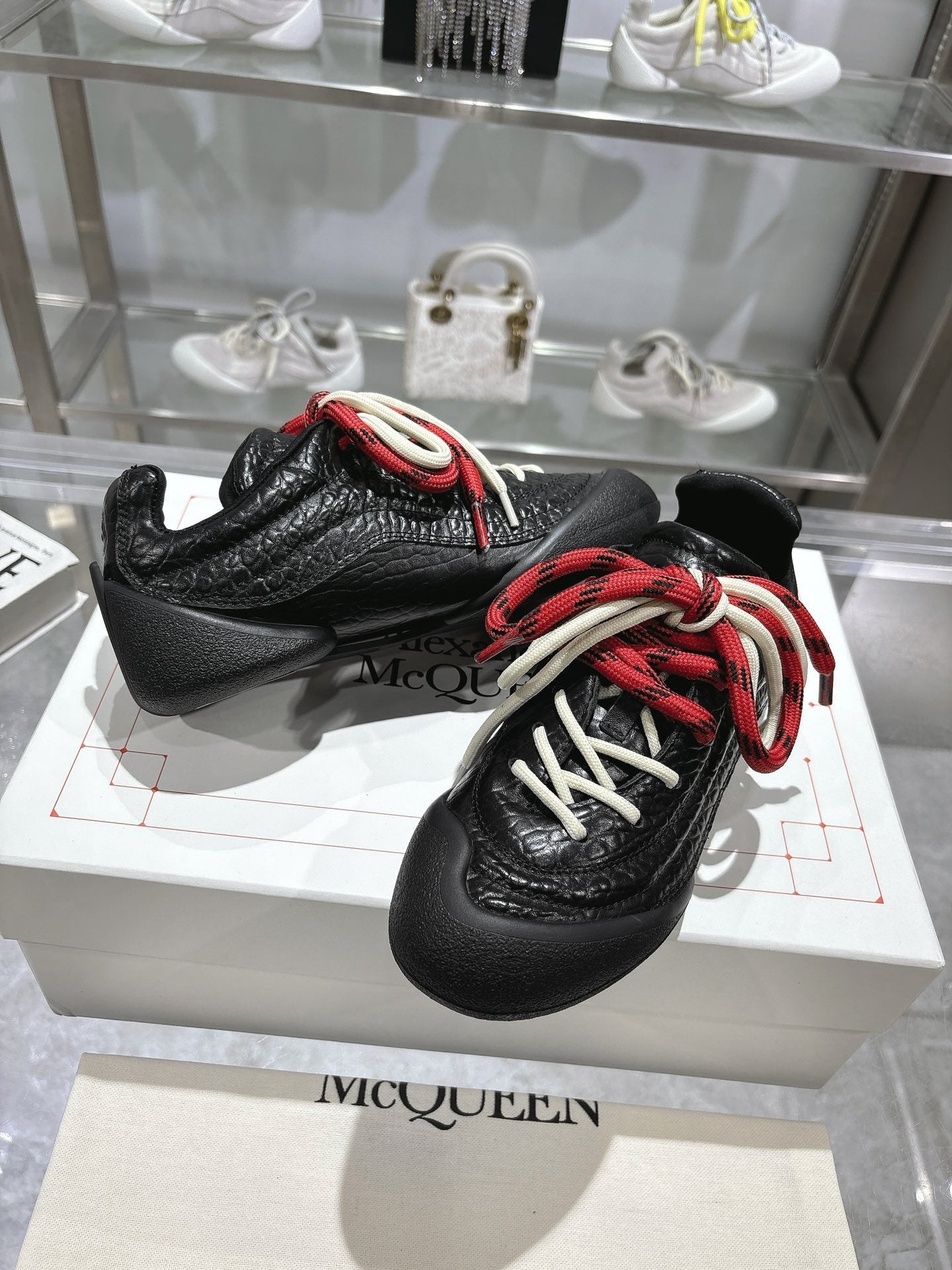 FLEXION SNEAKER IN BLACK CALFSKIN WITH RED AND WHITE LACES