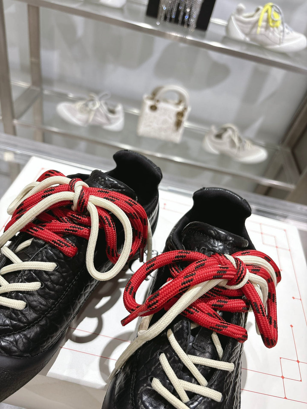 FLEXION SNEAKER IN BLACK CALFSKIN WITH RED AND WHITE LACES