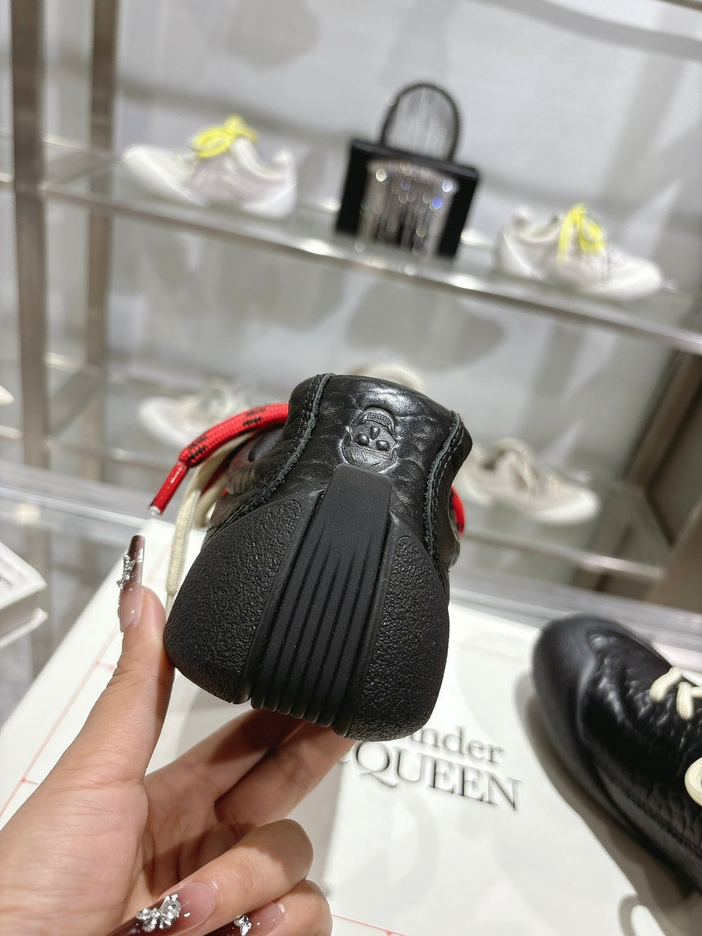 FLEXION SNEAKER IN BLACK CALFSKIN WITH RED AND WHITE LACES