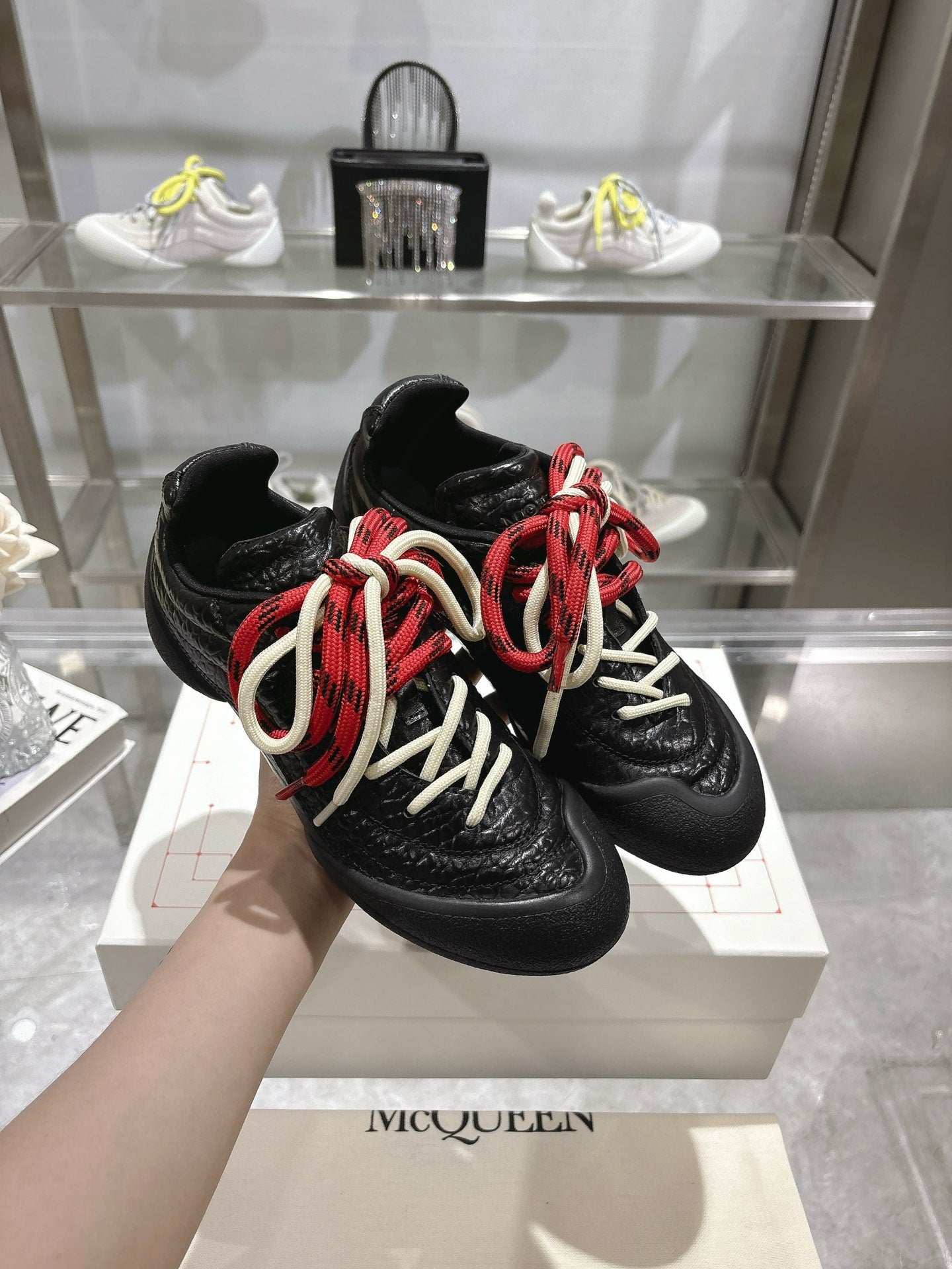 FLEXION SNEAKER IN BLACK CALFSKIN WITH RED AND WHITE LACES