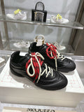 FLEXION SNEAKER IN BLACK CALFSKIN WITH RED AND WHITE LACES