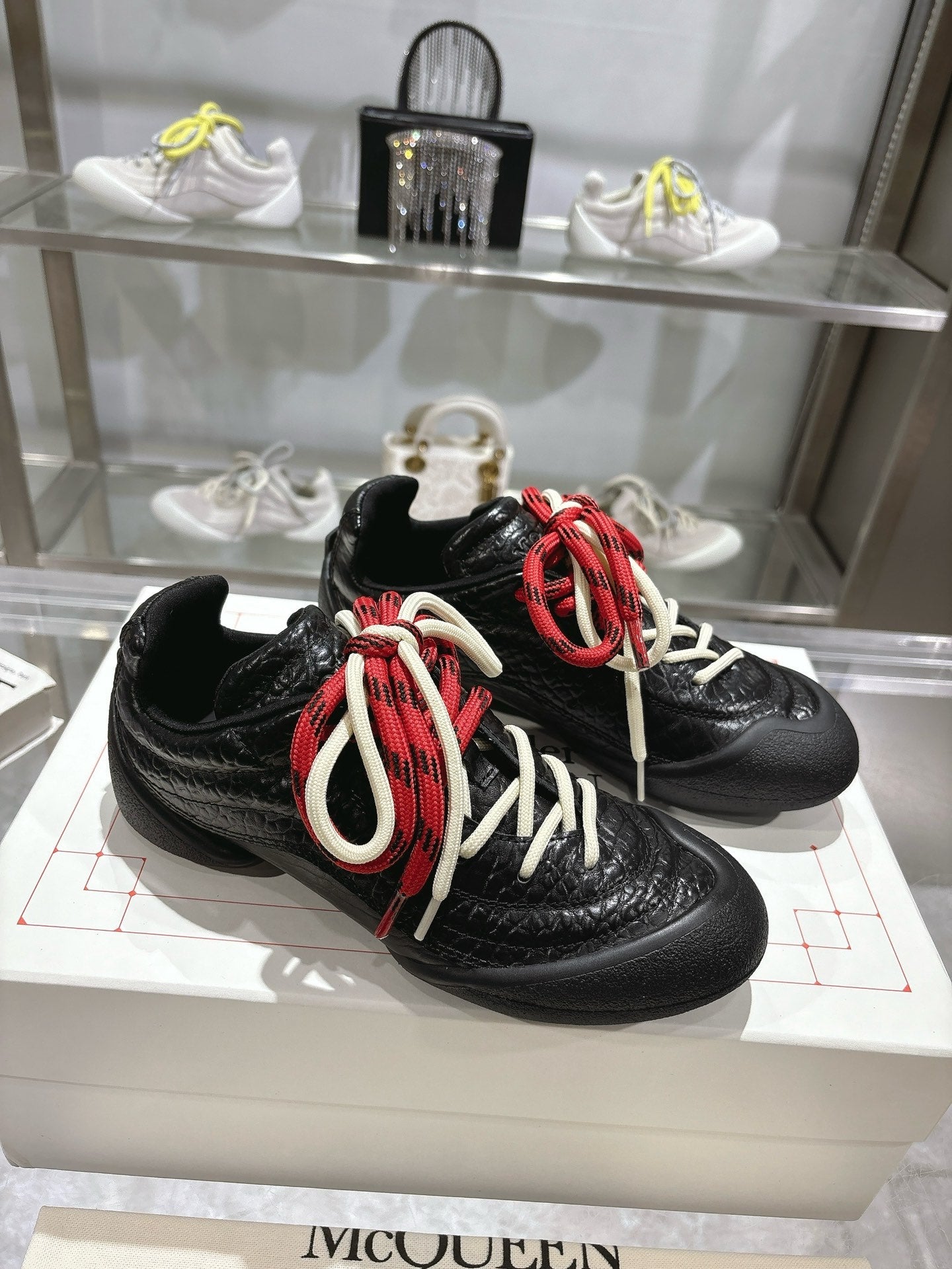 FLEXION SNEAKER IN BLACK CALFSKIN WITH RED AND WHITE LACES
