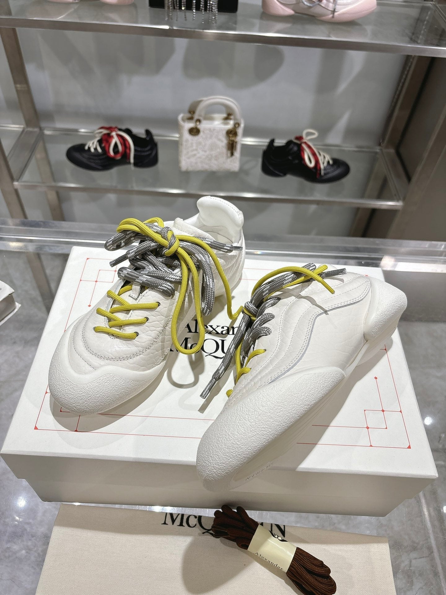 FLEXION SNEAKER IN OFF WHITE CALFSKIN WITH NEON YELLOW AND GREY LACES