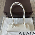 LE TECKEL SMALL BAG 27 IN WHITE GOATSKIN