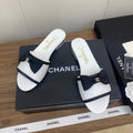 BOW SLIPPERS IN WHITE LAMBSKIN
