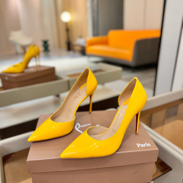 CHRISTIAN LOUBOUTIN 26S CUTOUT SIDE PUMP HEELS 105 MM IN YELLOW PATENT CALFSKIN