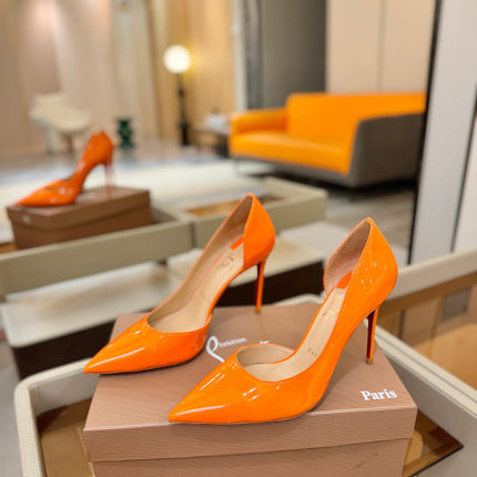 CHRISTIAN LOUBOUTIN 26S CUTOUT SIDE PUMP HEELS 105 MM IN ORANGE PATENT CALFSKIN