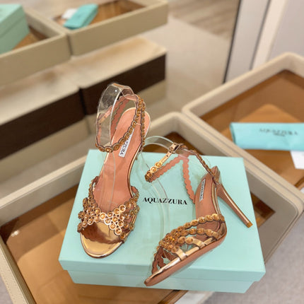 AQUAZZURA 26S STRAPPY HIGH HEELS 105 MM IN LIGHT GOLD PATENT LAMBSKIN