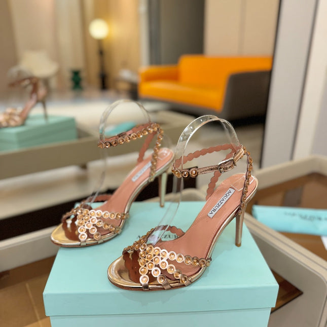 AQUAZZURA 26S STRAPPY HIGH HEELS 105 MM IN LIGHT GOLD PATENT LAMBSKIN