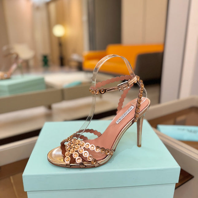 AQUAZZURA 26S STRAPPY HIGH HEELS 105 MM IN LIGHT GOLD PATENT LAMBSKIN