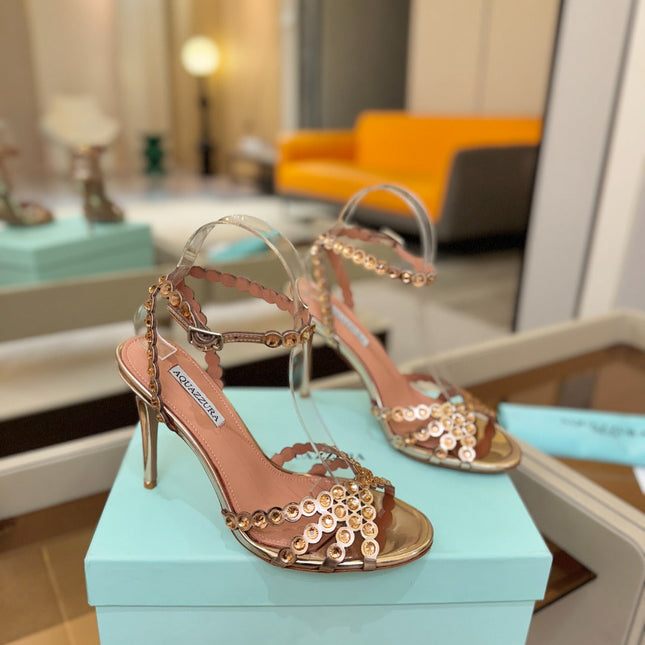 AQUAZZURA 26S STRAPPY HIGH HEELS 105 MM IN LIGHT GOLD PATENT LAMBSKIN