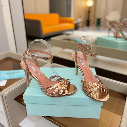 AQUAZZURA 26S STRAPPY HIGH HEELS 105 MM IN LIGHT GOLD PATENT LAMBSKIN