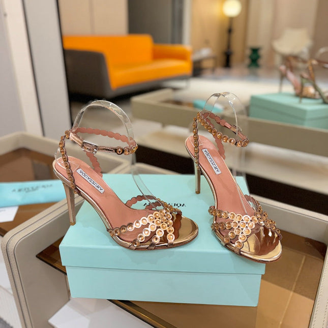 AQUAZZURA 26S STRAPPY HIGH HEELS 105 MM IN LIGHT GOLD PATENT LAMBSKIN