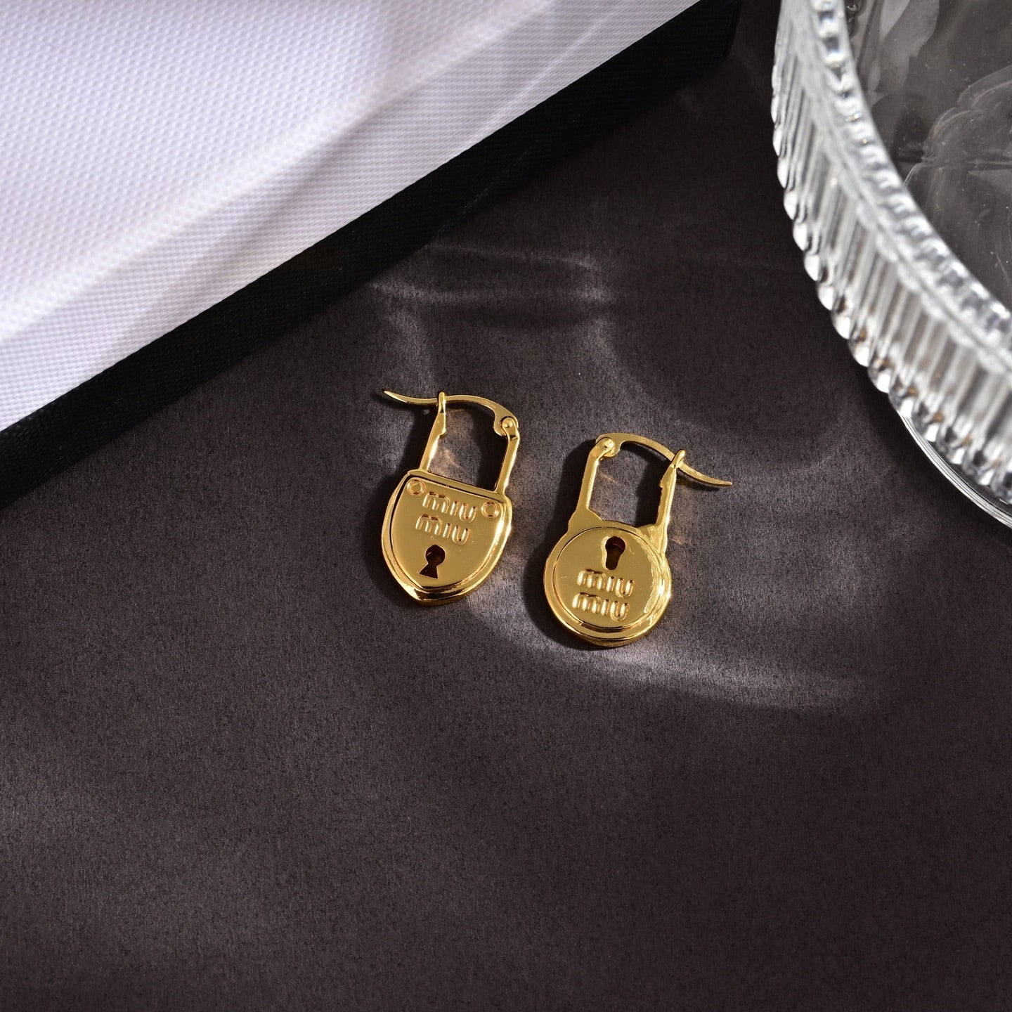 MIUMIU 26S PADLOCK DROP EARRINGS IN GOLD TONE METAL 630015