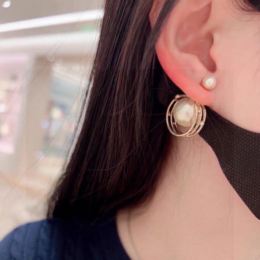 CD 26S DOUBLE PEARL ORBIT EARRINGS IN GOLD TONE METAL 630833