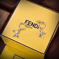 FENDI 26S FF RIBBON CHARM HOOP EARRINGS IN SILVER TONE METAL 634938