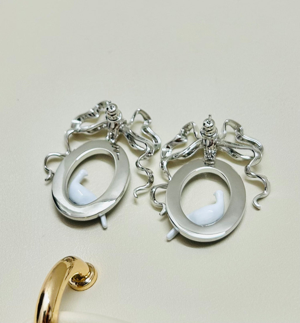CD 26S TOILE DE JOUY BIRD BOW DROP EARRINGS IN SILVER TONE METAL 644371