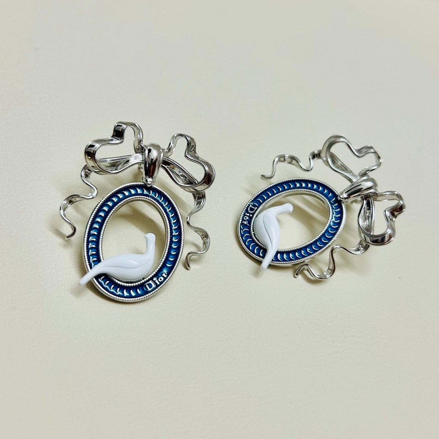 CD 26S TOILE DE JOUY BIRD BOW DROP EARRINGS IN SILVER TONE METAL 644371