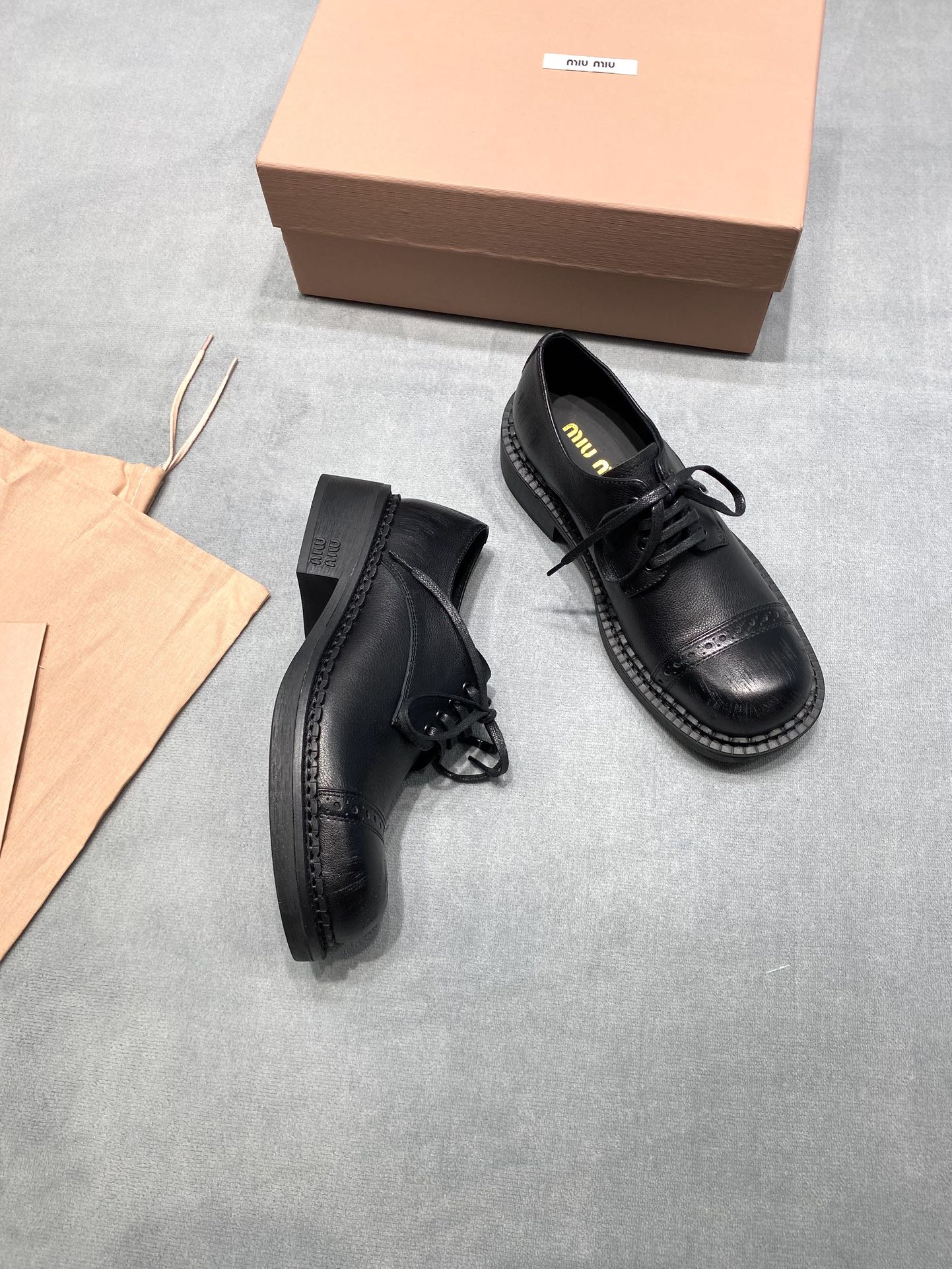 MIUMIU 26S LACE-UP LOAFERS IN BLACK GRAINED CALFSKIN